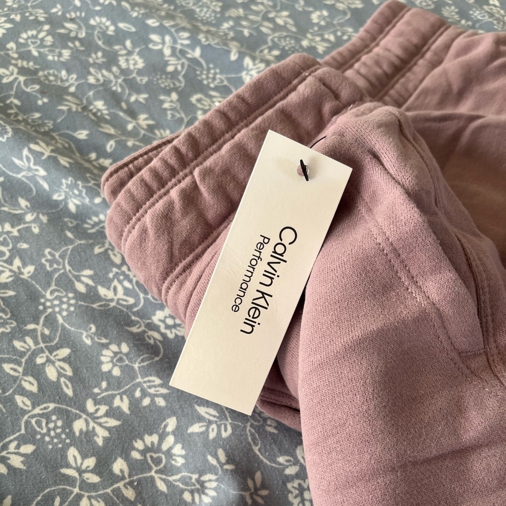 Women’s purple size large Calvin Klein cargo style sweats.